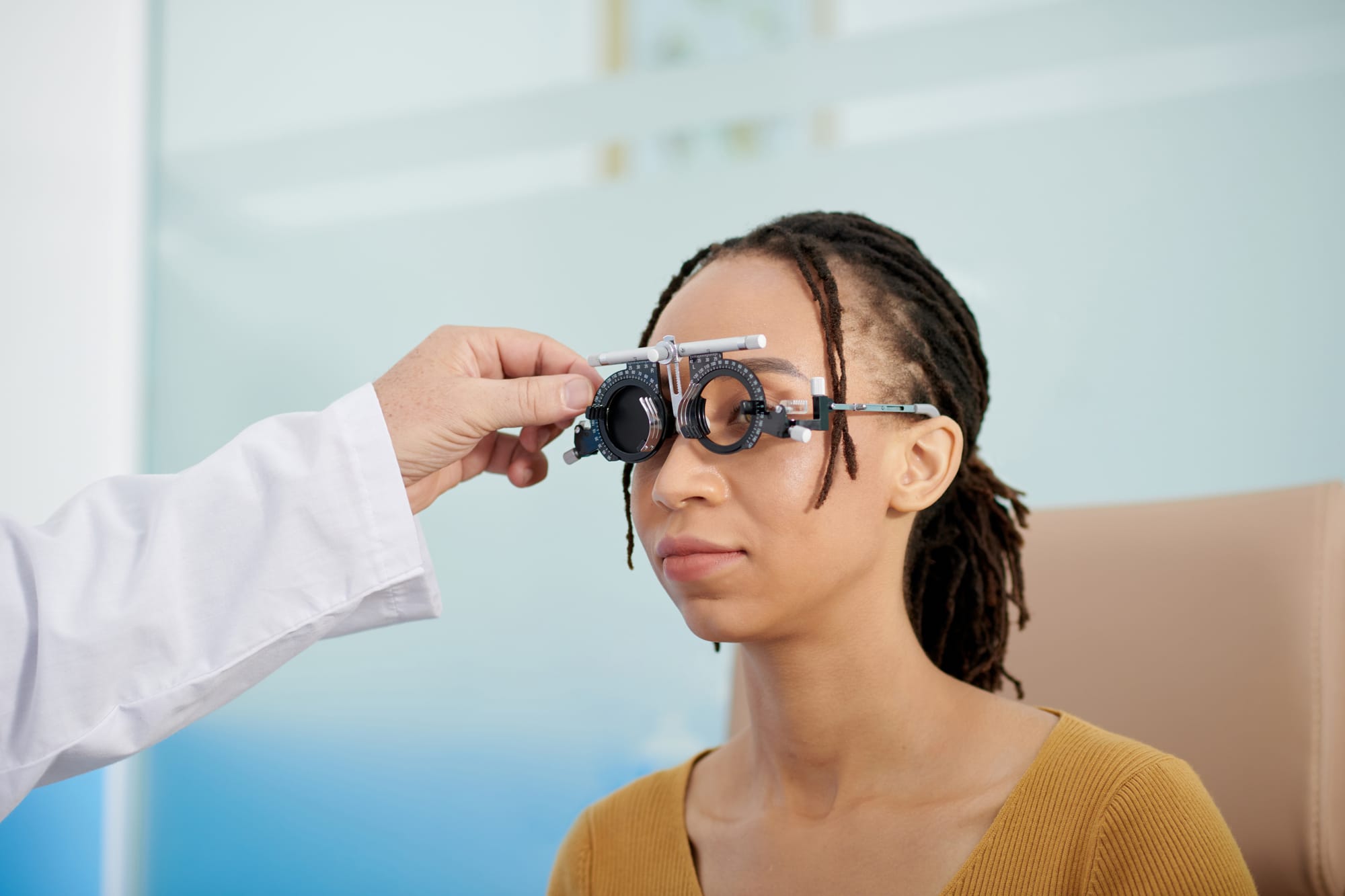 Doctor Measuring Distance Between Eyes Doctor Measuring Distance Between Eyes