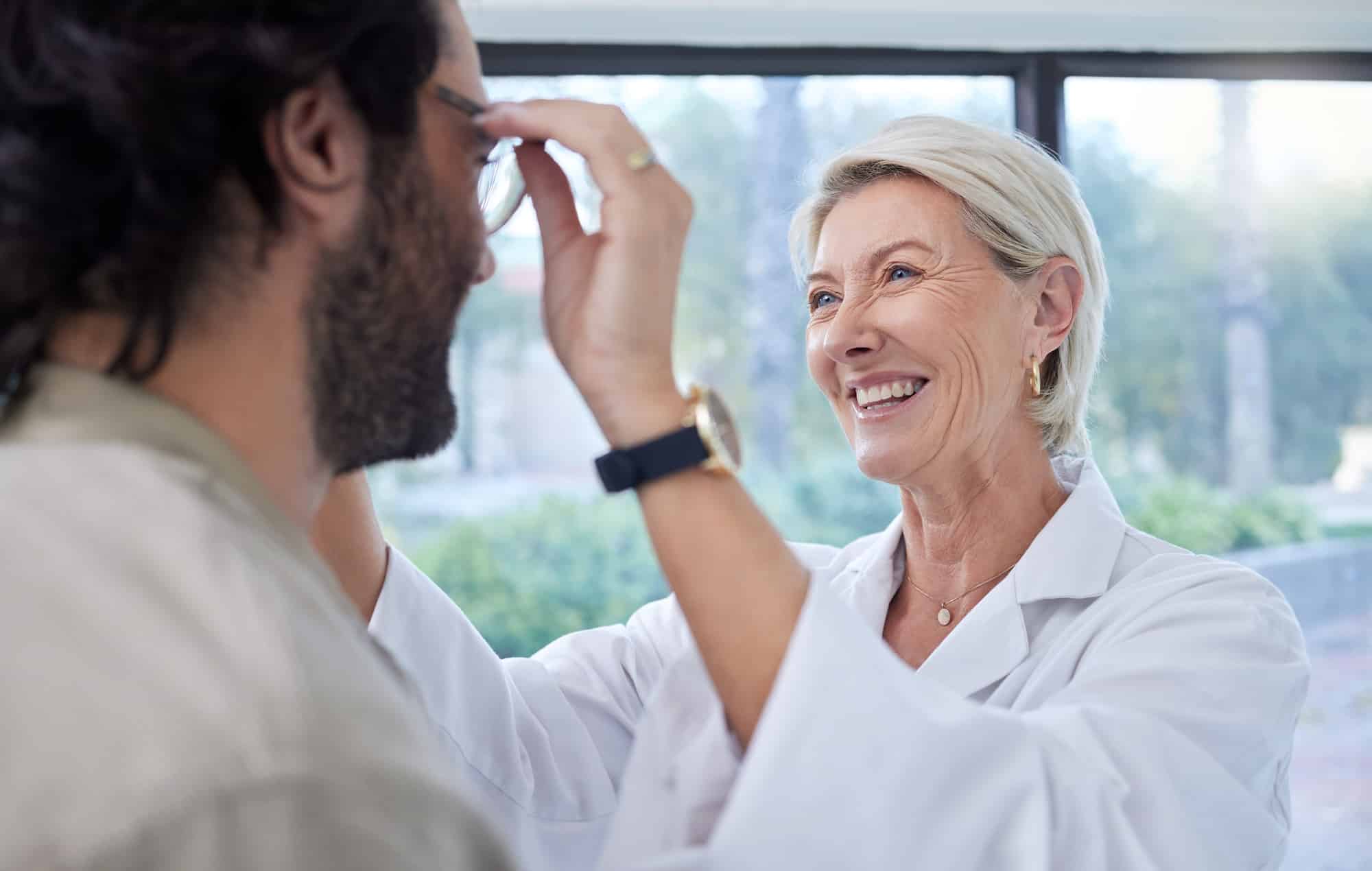 optometrist woman and helping customer eye and g utc () optometrist woman and helping customer eye and g utc ()