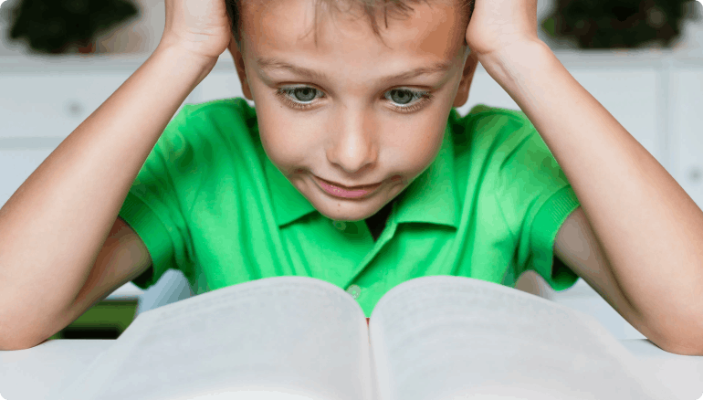 Child struggling with reading and learning difficulties caused by binocular vision dysfunction